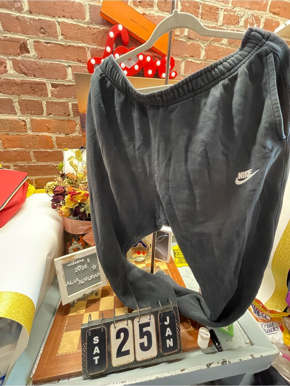 black Nike Sportswear Club Fleece joggers featuring